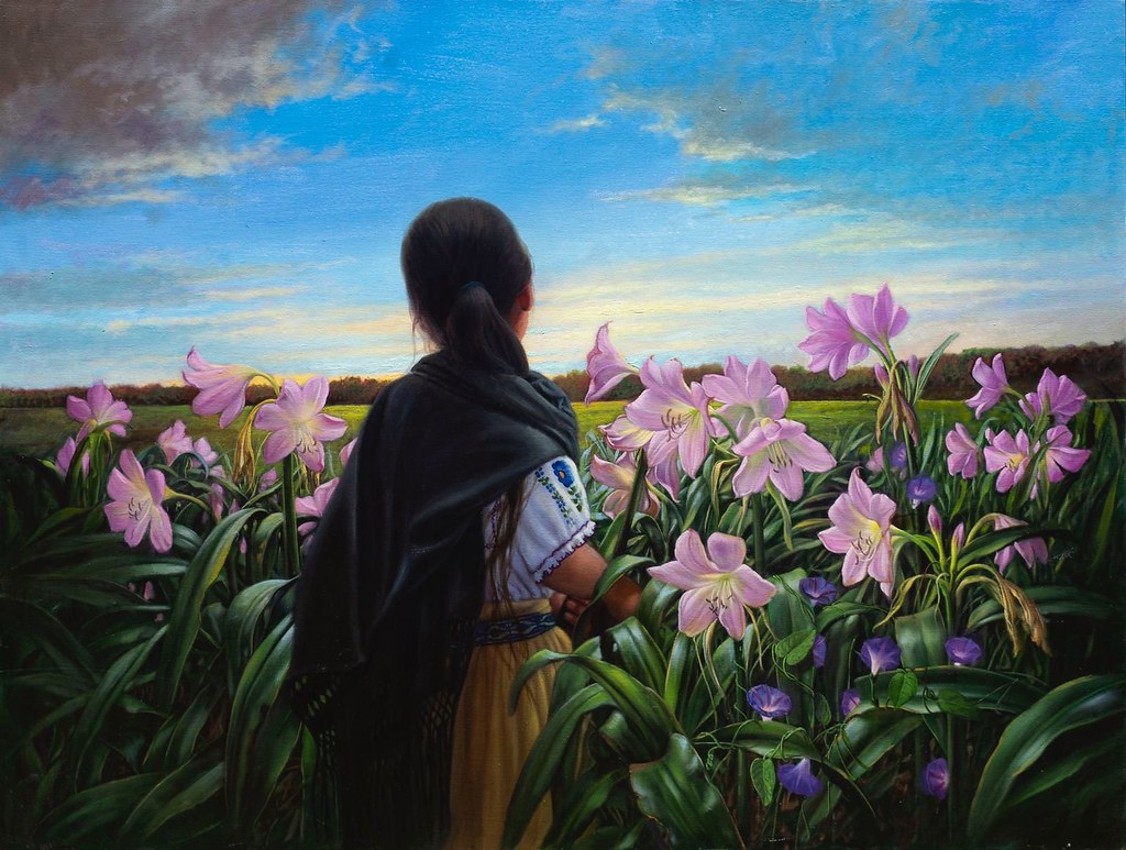 Mujer en campo de azucenas